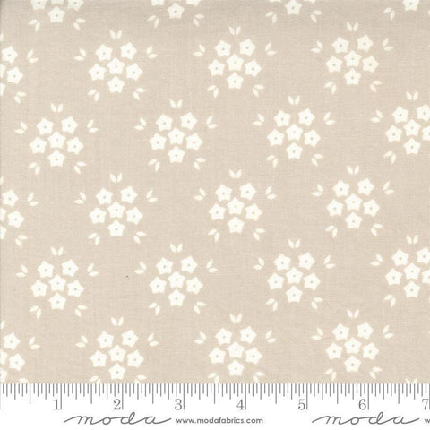 Image of the Hollyhocks Roses Puffs Linen quilting cotton fabric by Moda Fabrics. Features small flowers on a tan background. 
Cute Little Fabric Shop