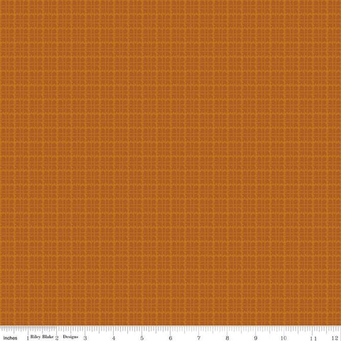 Image of the Stitchers Flannel Plaid Spice flannel fabric by Vicki McCarty for Riley Blake Designs. Features a small plaid patterns on a brown orange background.
Cute Little Fabric Shop
