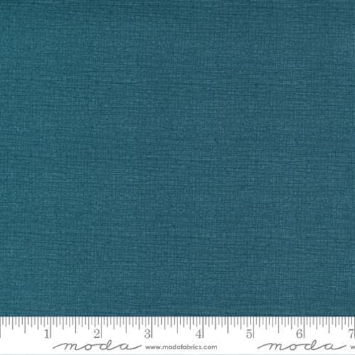 Thatched Lagoon quilting cotton fabric by Gingiber for Moda Fabrics. Features a textured and lined pattern on a blue background. 
Cute Little Fabric Shop