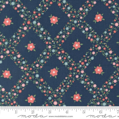Image of the Rosemary Cottage Trellis Navy quilting cotton fabric by Moda Fabrics. Features criss cross flowers on a dark blue background.
Cute Little Fabric Shop