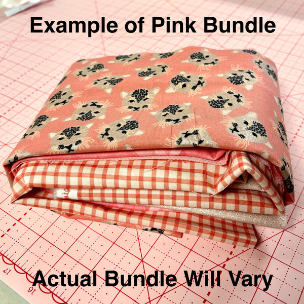 Image of a pink mystery bundle using quilting cotton fabric by Riley Blake Designs. Features a pink bundle. 
Cute Little Fabric Shop