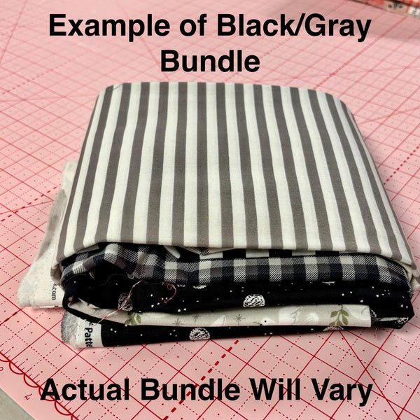 Image of a black/gray mystery bundle using quilting cotton fabric by Riley Blake Designs. Features a black/gray bundle. 
Cute Little Fabric Shop