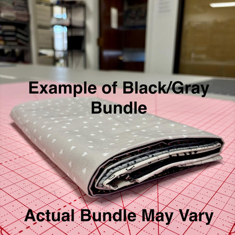 Image of a black/gray themed fat quarter mystery bundle using quilting cotton fabric by Riley Blake Designs. Features a black/gray bundle. 
Cute Little Fabric Shop