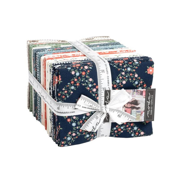 Image of the Rosemary Cottage 40 piece fat quarter bundle. Features floral fabrics on blue, pink, and cream fabrics. 
Cute Little Fabric Shop