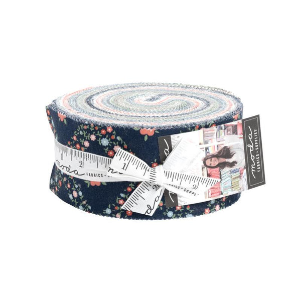 Image of the Rosemary Cottage rolie polie by Camille Roskelley for Moda Fabrics. Features a rolie polie precut with floral fabrics. 
Cute Little Fabric Shop