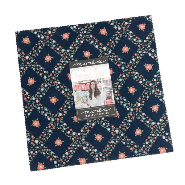 Image of the Rosemary Cottagae 10 inch layer cake by Camille Roskelley for Moda Fabrics. Features layer cake precut with floral fabrics. 
Cute Little Fabric Shop