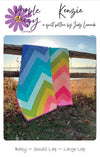 Image of the Kenzie Quilt Pattern by Purple Daisy Quilt Designs for Riley Blake Designs. Features half square triangles that create a rainbow of elongated chevron stripes. 
Cute Little Fabric Shop