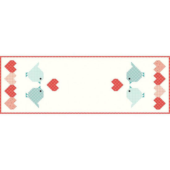 Image of the Heart to Heart quilt pattern by Sandy Gervais for Riley Blake Designs. Features lovebirds, Xs, Os, and the word LOVE on a runner quilt.
Cute Little Fabric Shop