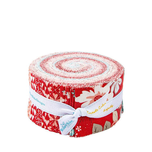 Image of the You & Me Rolie Polie by Sandy Gervais for Riley Blake Designs. Features valentines day fabrics with red, pink, and cream backgrounds. 
Cute Little Fabric Shop