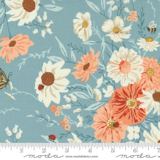 Image of the Farmstead  Main Mountain Stream quilting cotton fabric by Stacy Iest Hsu for Moda Fabrics. Features large flowers and blossoms on a blue background. 
Cute Little Fabric Shop