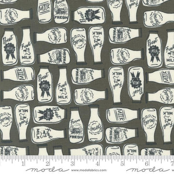 Image of the Farmstead Milk Charcoal quilting cotton fabric by Stacy Iest Hsu for Moda Fabrics. Features bottles of milk on a dark grey background. 
Cute Little Fabric Shop