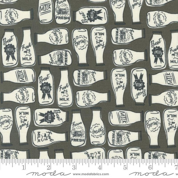 Image of the Farmstead Milk Charcoal quilting cotton fabric by Stacy Iest Hsu for Moda Fabrics. Features bottles of milk on a dark grey background. 
Cute Little Fabric Shop