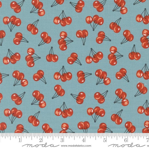 Image of the Farmstead Cherries Mountain Stream quilting cotton fabric by Stacy Iest Hsu for Moda Fabrics. Features small cherries on a dusty blue background. 
Cute Little Fabric Shop