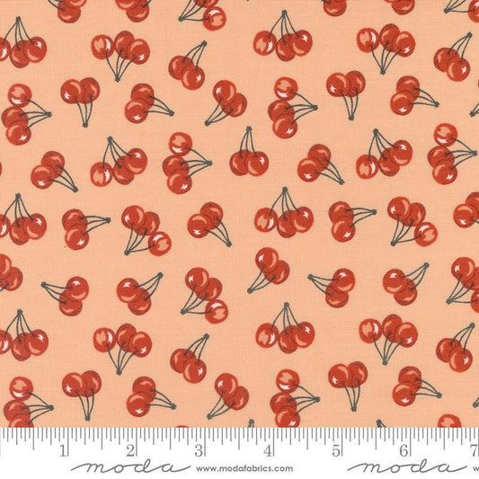 Image of the Farmstead Cherries Light Coral quilting cotton fabric by Stacy Iest Hsu for Moda Fabrics. Features small cherries on a light orange background. 
Cute Little Fabric Shop