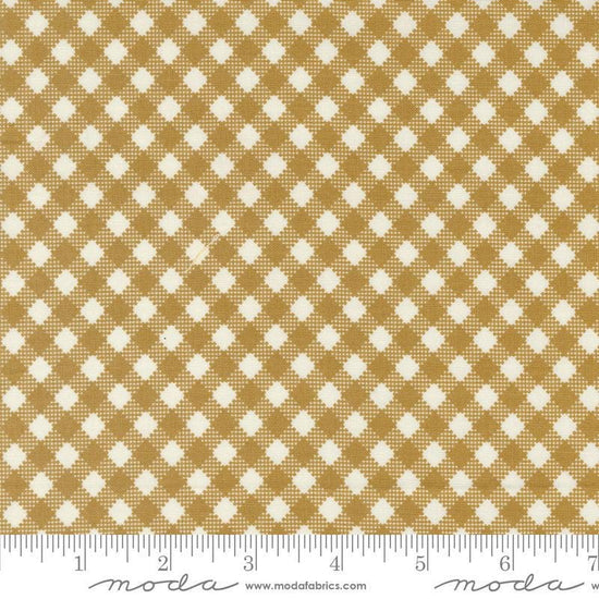 Image of the Farmstead Gingham Haystack quilting cotton fabric by Stacy Iest Hsu for Moda Fabrics. Features printed diagonal gingham on a mustard background. 
Cute Little Fabric Shop
