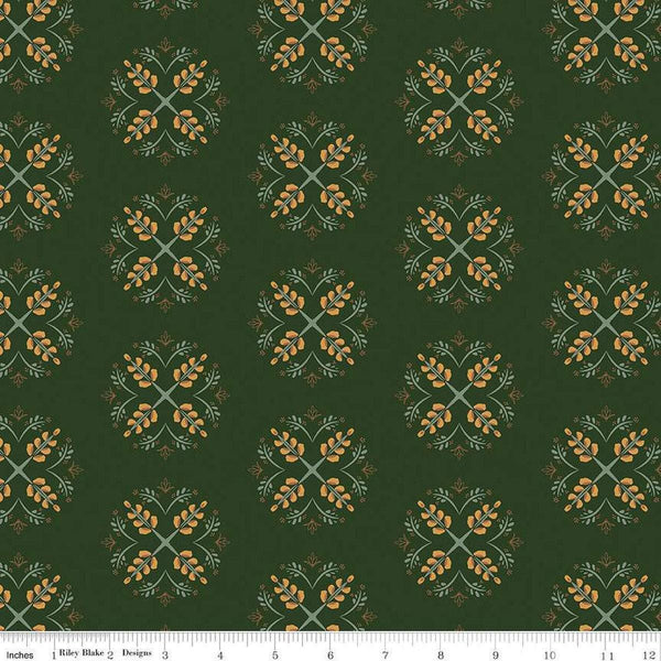 Dark forest green colored quilting cotton fabric with geometric flowers, leaves, and stems. 
Cute Little Fabric Shop