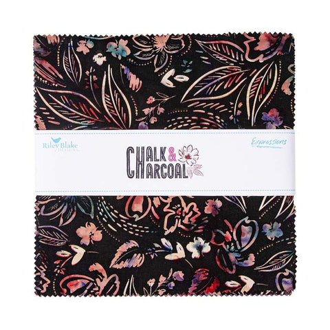 Image of the Expressions Batiks Chalk and Charcoal 10 inch Stacker B. Features floral batik flowers with red, orange, and pink colors. 
Cute Little Fabric Shop