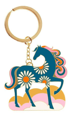 Image of the Carousel Keychain by Alexia Abegg for Moda Fabrics. Features a flower covered pony on a keychain. 
Cute Little Fabric Shop
