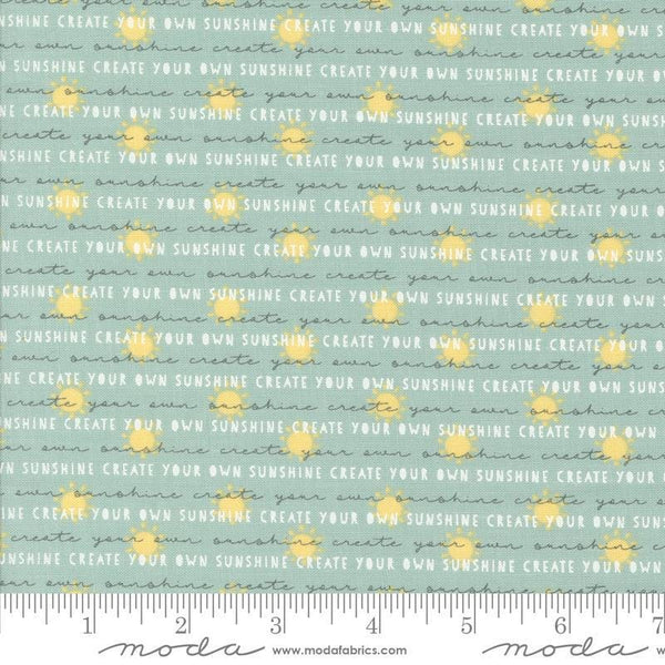 Image of the Shine Text Sky quilting cotton fabric by Sweetwater for Moda Fabrics. Features text with sunshines on a light green blue background. 
Cute Little Fabric Shop