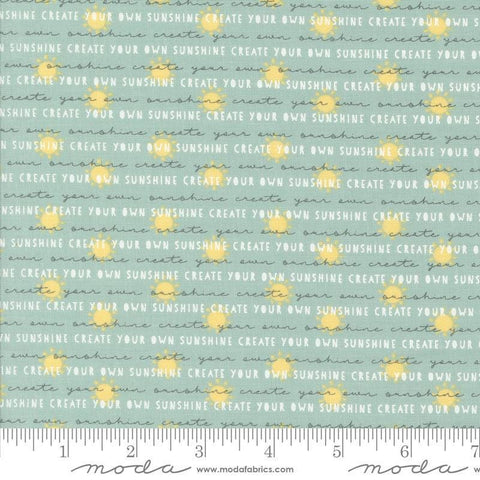 Image of the Shine Text Sky quilting cotton fabric by Sweetwater for Moda Fabrics. Features text with sunshines on a light green blue background. 
Cute Little Fabric Shop