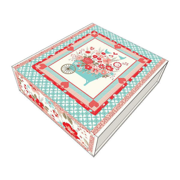 Image of the You & Me Panel Quilt Boxed Kit by Sandy Gervais for Riley Blake Designs. Features birds in a wagon with valentines day fabrics. 
Cute Little Fabric Shop