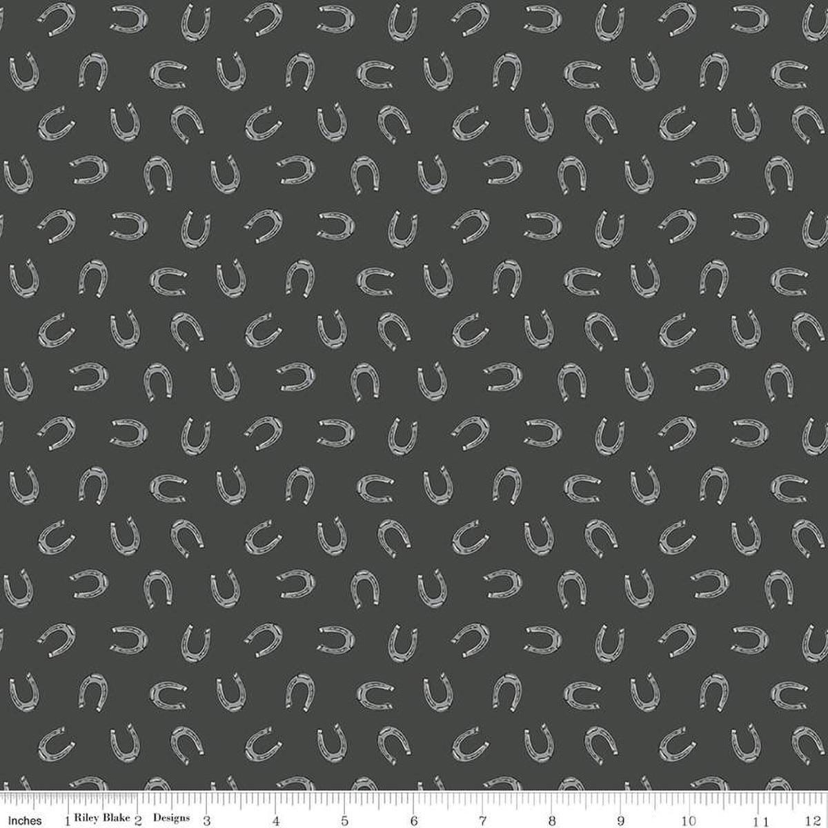 Image of the Cowboys Horseshoes Granite quilting cotton fabric by Echo Park Paper Co for Riley Blake Designs. Features horseshoes on a dark grey background.
Cute Little Fabric Shop