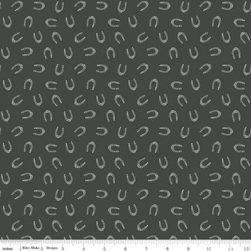 Image of the Cowboys Horseshoes Granite quilting cotton fabric by Echo Park Paper Co for Riley Blake Designs. Features horseshoes on a dark grey background.
Cute Little Fabric Shop