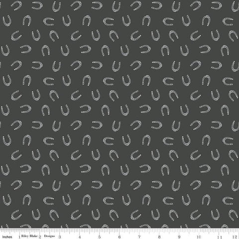 Image of the Cowboys Horseshoes Granite quilting cotton fabric by Echo Park Paper Co for Riley Blake Designs. Features horseshoes on a dark grey background.
Cute Little Fabric Shop