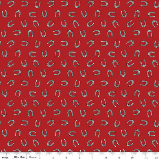 Image of the Cowboys Horseshoes Barn Red quilting cotton fabric by Echo Park Paper Co for Riley Blake Designs. Features horseshoes on a dark red background.
Cute Little Fabric Shop