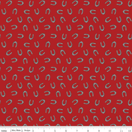 Image of the Cowboys Horseshoes Barn Red quilting cotton fabric by Echo Park Paper Co for Riley Blake Designs. Features horseshoes on a dark red background.
Cute Little Fabric Shop