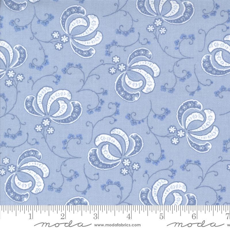 Image of the Hollyhocks Roses Bloom Sky quilting cotton fabric by Moda Fabrics. Features flowers and leaves on a blue lavendar background. 
Cute Little Fabric Shop