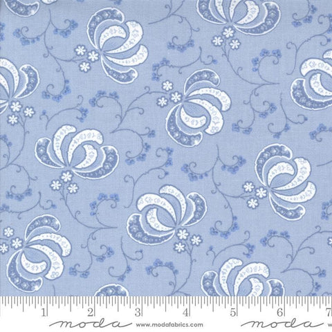 Image of the Hollyhocks Roses Bloom Sky quilting cotton fabric by Moda Fabrics. Features flowers and leaves on a blue lavendar background. 
Cute Little Fabric Shop