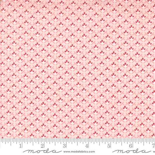 Image of the Hollyhocks Roses Trellis Hollyhock Pink quilting cotton fabric by Moda Fabrics. Features small roses in a geometric pattern on a pink background. 
Cute Little Fabric Shop