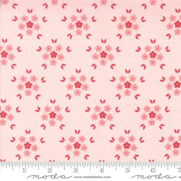 Image of the Hollyhocks Roses Puffs Hollyhock Pink quilting cotton fabric by Moda Fabrics. Features small flowers on a pink background. 
Cute Little Fabric Shop