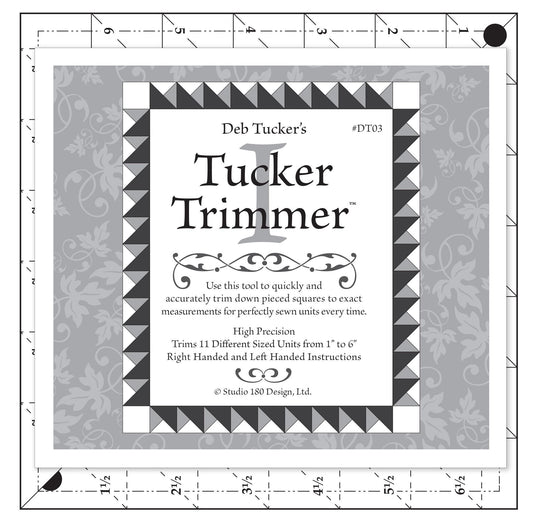 Image of the Tucker Trimmer Ruler by QT Fabrics. Features square plastic ruler.
Cute Little Fabric Shop