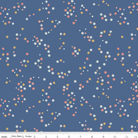 Image of the Between the Pages Flowers Denim quilting cotton fabric by Fran Gulick for Riley Blake Designs. Features scattered small flowers on a blue background. 
Cute Little Fabric Shop