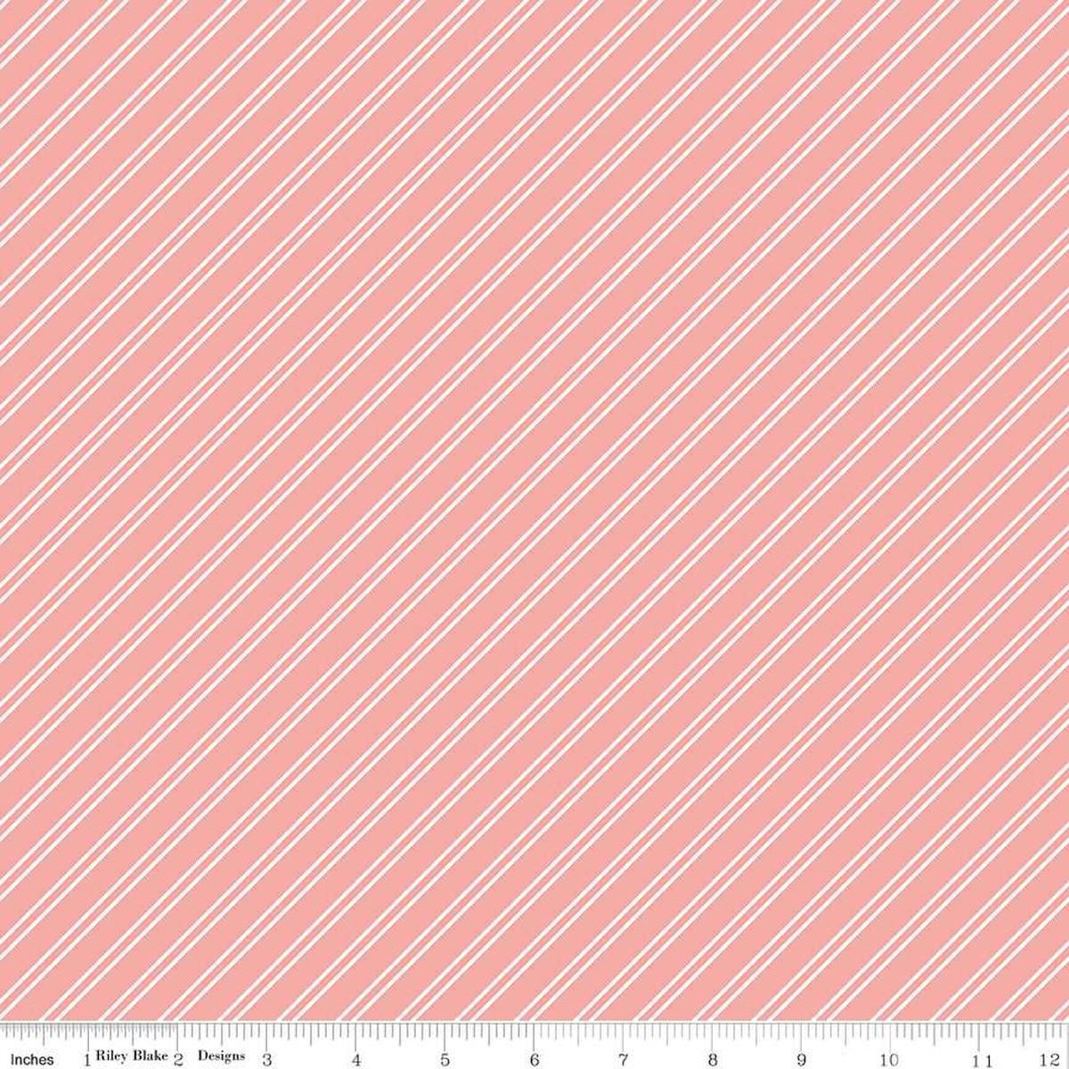 Image of the Between the Pages Stripes Coral quilting cotton fabric by Fran Gulick for Riley Blake Designs. Features diagonal small stripes on a light pink background. 
Cute Little Fabric Shop
