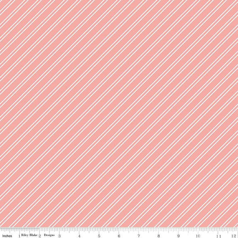 Image of the Between the Pages Stripes Coral quilting cotton fabric by Fran Gulick for Riley Blake Designs. Features diagonal small stripes on a light pink background. 
Cute Little Fabric Shop