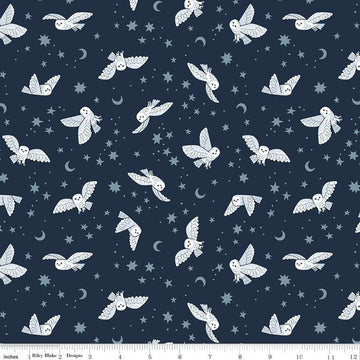 Image of the Twilight Creatures Night Owls Indigo quilting cotton fabric by Natàlia Juan Abelló for Riley Blake Designs. Features scattered owls, stars, moons, and dots on a dark blue background. 
Cute Little Fabric Shop