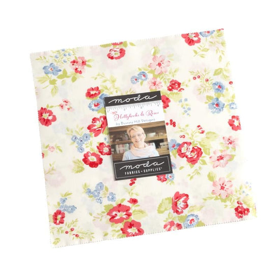 Image of the Hollyhocks and Roses 10 Inch Stacker. Features floral fabrics with pink, white, and blue. 
Cute Little Fabric Shop