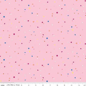 Image of the Celebrate Confetti Pink
 quilting cotton fabric by Sue Daley for Riley Blake Designs. Features brightly colored dots and crescent moons on a light pink background.
Cute Little Fabric Shop