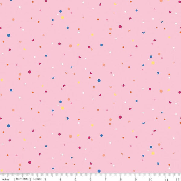 Image of the Celebrate Confetti Pink
 quilting cotton fabric by Sue Daley for Riley Blake Designs. Features brightly colored dots and crescent moons on a light pink background.
Cute Little Fabric Shop