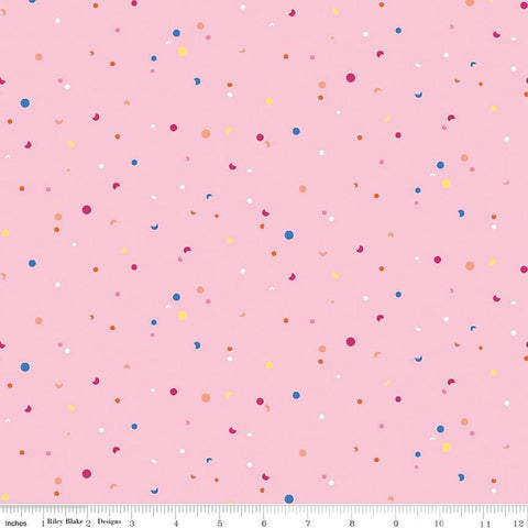 Image of the Celebrate Confetti Pink
 quilting cotton fabric by Sue Daley for Riley Blake Designs. Features brightly colored dots and crescent moons on a light pink background.
Cute Little Fabric Shop