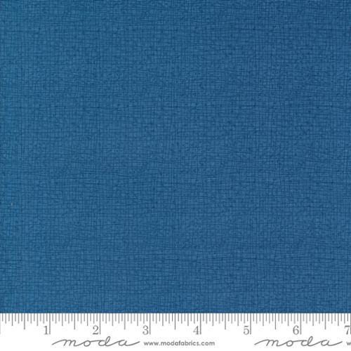 Thatched Coastal quilting cotton fabric by Gingiber for Moda Fabrics. Features a textured and lined pattern on a blue background. 
Cute Little Fabric Shop