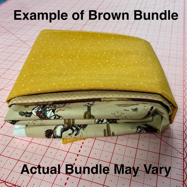 Image of a brown themed mystery bundle using quilting cotton fabric by Riley Blake Designs. Features a brown bundle. 
Cute Little Fabric Shop