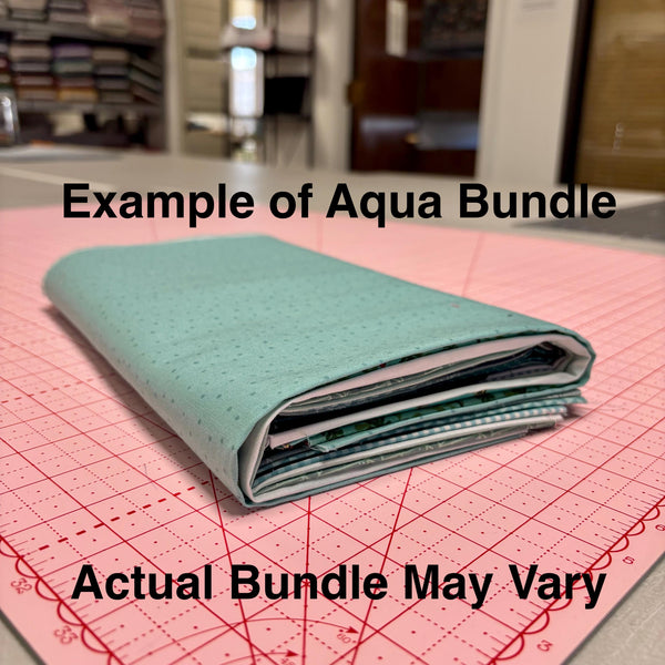 Image of an aqua themed fat quarter mystery bundle using quilting cotton fabric by Riley Blake Designs. Features an aqua bundle. 
Cute Little Fabric Shop