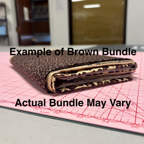 Image of a brown themed fat quarter mystery bundle using quilting cotton fabric by Riley Blake Designs. Features a brown bundle. 
Cute Little Fabric Shop