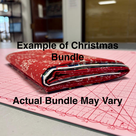 Image of a christmas themed fat quarter mystery bundle using quilting cotton fabric by Riley Blake Designs. Features a christmas bundle. 
Cute Little Fabric Shop