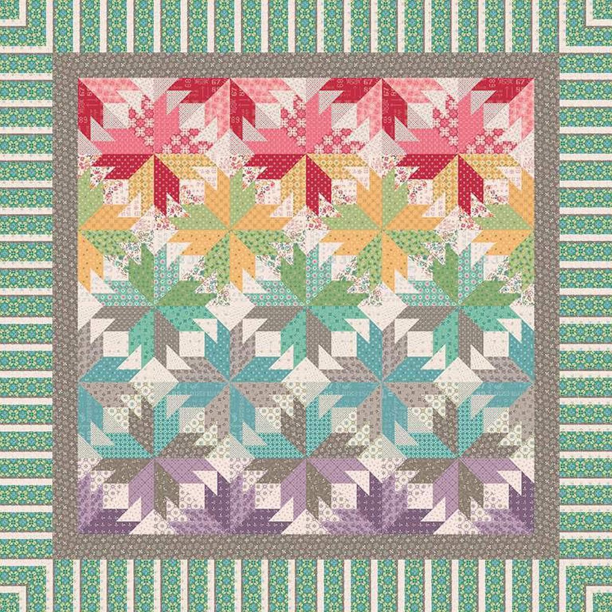 Image of the Indian Summer in Autumn quilt pattern by Quiltworx for Riley Blake Designs. Features a star pattern on a multicolored quilt.