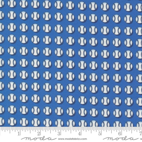 Image of the Play Ball Baseball Bluejay quilting cotton fabric by Moda Fabrics. Features novelty scattered baseballs on a blue background. 
Cute Little Fabric Shop